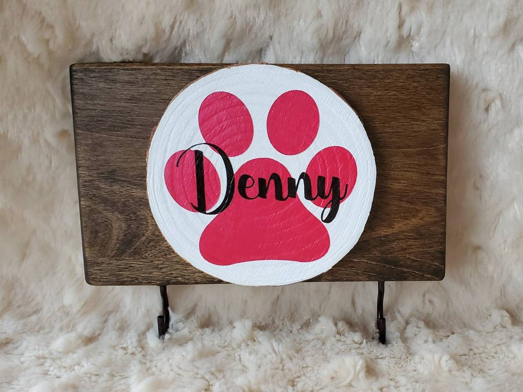 Denny paw print leash holder design coral paw white background dark walnut stain