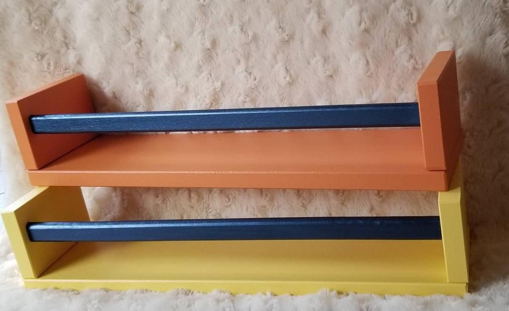 Color Block painted shelves with metallic painted bar