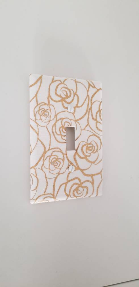 Gold Outlined Roses Light Switch Plate on white wall