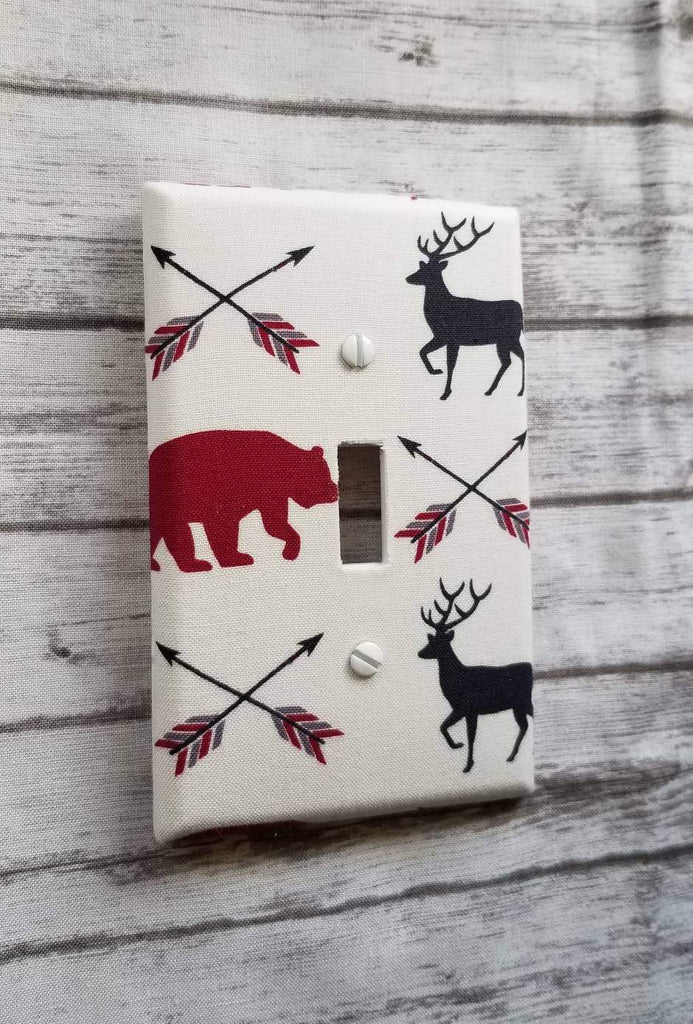 Woodland Light Switch on rustic background
